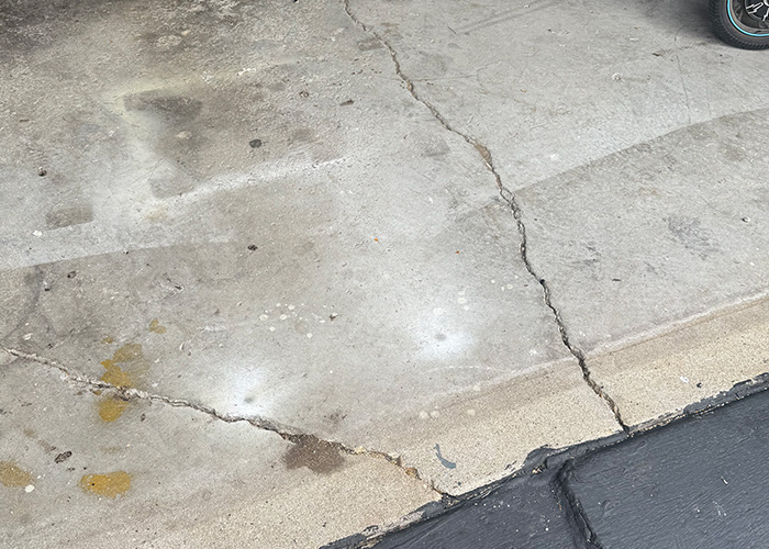 Concrete crack repair and floor leveling before epoxy flooring installation in Rockford IL
